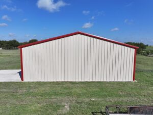 40x50 Red Iron Steel Building with Wraparound Porch in Kaufman, TX.
