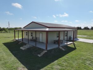 40x50 Red Iron Steel Building with Wraparound Porch in Kaufman, TX.