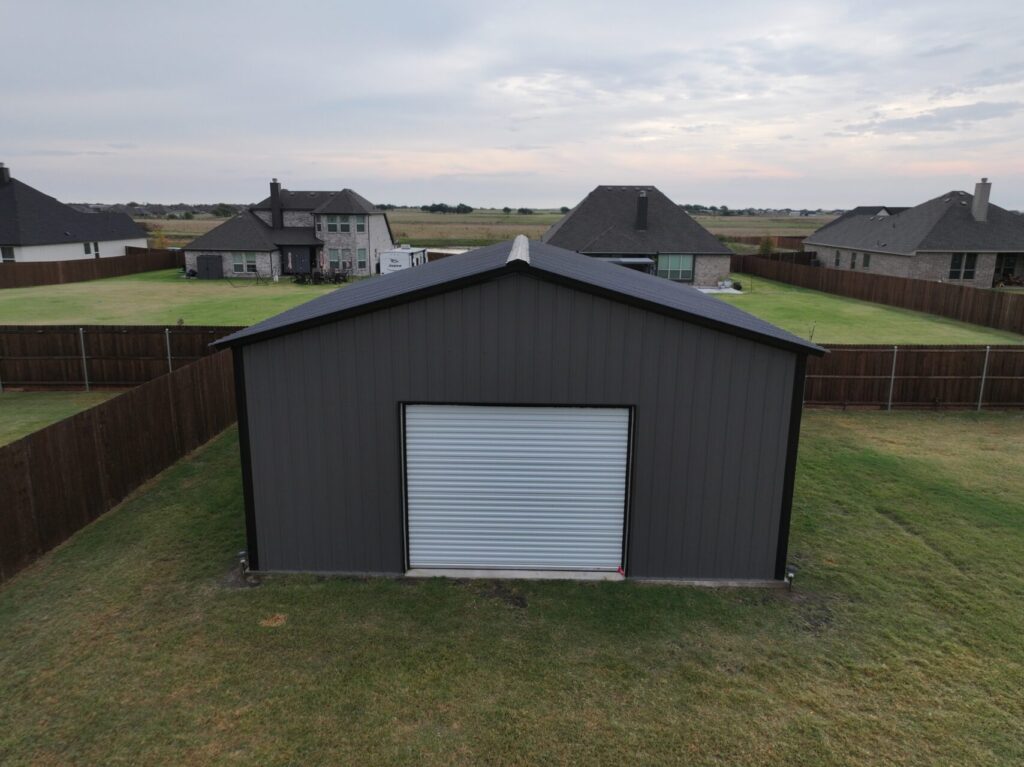 24x25 Black and Grey Tubular Metal Building in Godley, TX.