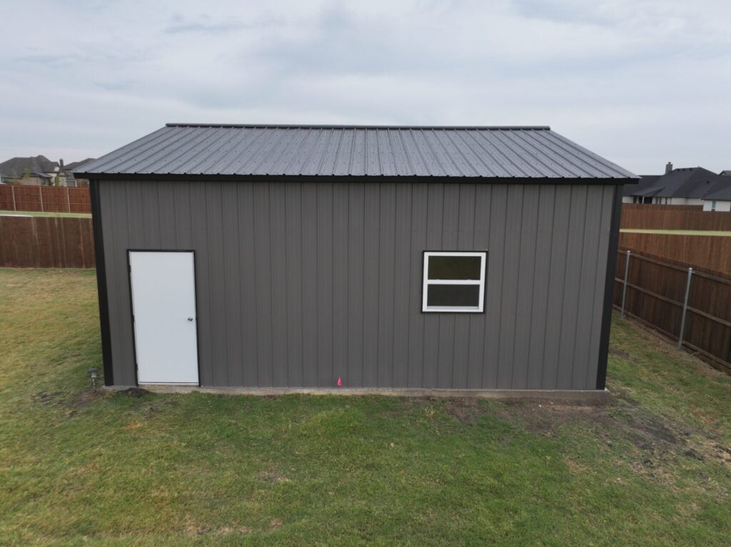24x25 Black and Grey Tubular Metal Building in Godley, TX.