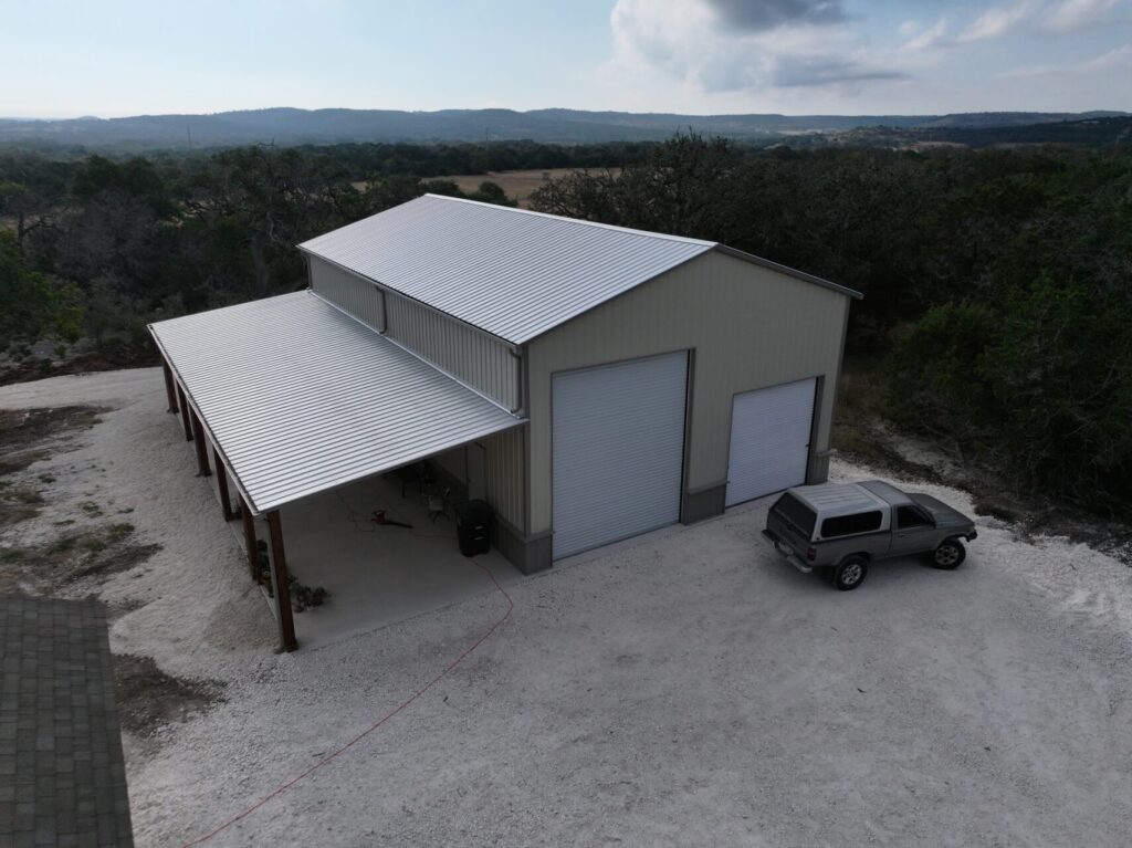 30x50 Two Car Metal Garage with Side Porch in Center Point, TX.