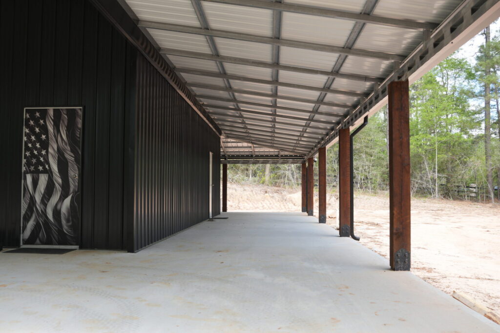 30x60 Custom Blacked-Out Shop with Wrap-around Porch in Montgomery, TX.